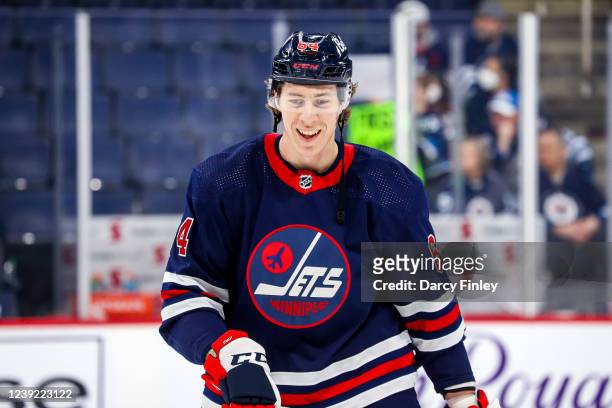 Logan Stanley of the Winnipeg Jets takes part in the pre-game warm up prior to NHL action against the Vegas Golden Knights at the Canada Life Centre...