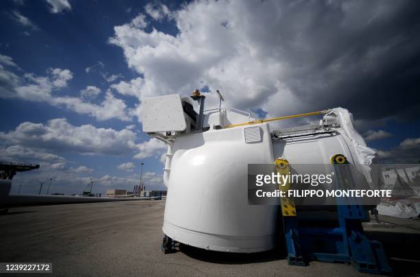 Wind turbine generator is pictured within its assembly for the Taranto offshore wind turbines farm on March 10, 2022 in Taranto, southern Italy. The...