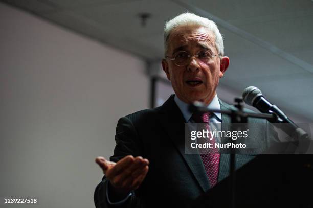 Former Colombian president Alvaro Uribe Velez speaks during the Centro Democratico political party meeting to choose a path for the 2022 presidential...