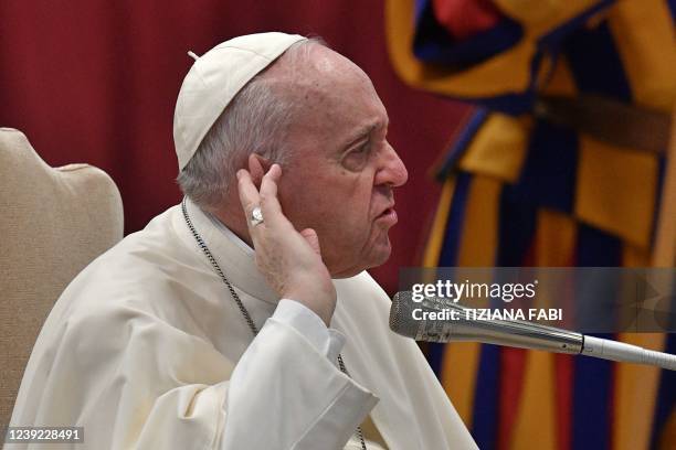 Pope Francis gestures during an audience on March 16, 2022 for the 50th anniversary of Milan's school "La Zolla", at St. Peter's basilica in The...