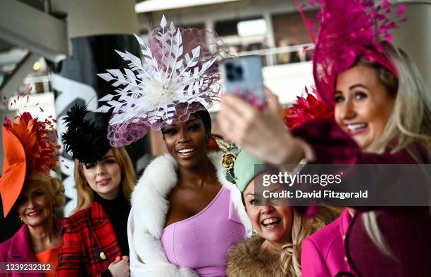 Gloucestershire , United Kingdom - 16 March 2022; Racegoers on Ladies day prior to racing on day two of the Cheltenham Racing Festival at Prestbury...