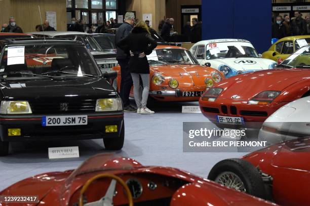 Cars are on display on March 16, 2022 at the Artcurial auction house's public viewing stand prior to the official sales on March 18 at the...