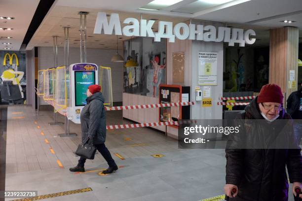 View of a closed McDonald's restaurant at a shopping mall in Moscow on March 16, 2022. - On February 24, Putin ordered Russian troops to pour into...
