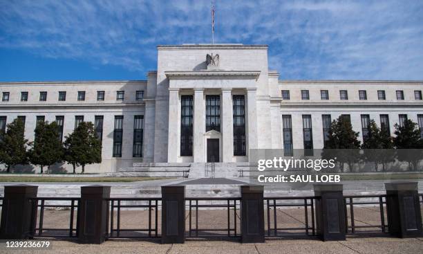 The Marriner S. Eccles Federal Reserve Board building is seen in Washington, DC, March 16, 2022. - The Federal Reserve is expected to announce the...