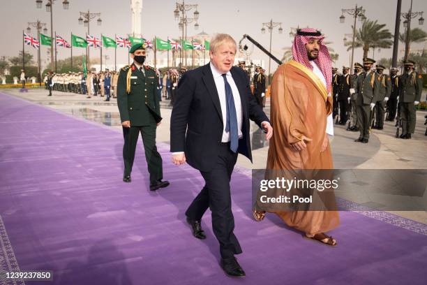 Prime Minister Boris Johnson is welcomed by Mohammed bin Salman, Crown Prince of Saudi Arabia, ahead of a meeting at the Royal Court on March 16,...
