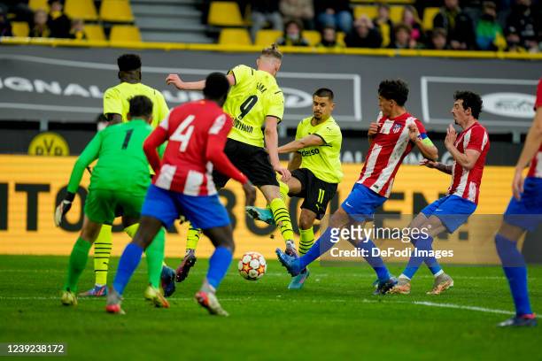 Lion Semic of Borussia Dortmund battle for the ball during the UEFA Youth League quarterfinal match between Borussia Dortmund and Atletico Madrid at...