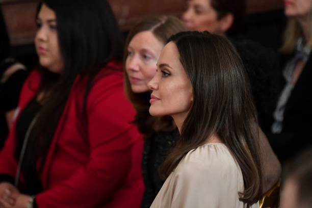 Actress Angelina Jolie attends an event celebrating the reauthorization of the Violence Against Women Act, in the East Room of the White House in...