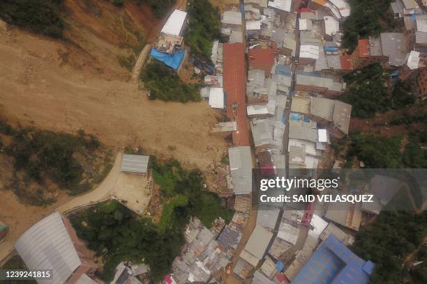 Aerial view of the landslide of stone and mud that buried dozens of houses in Retamas town, Parcoy district northern Peru, on March 15, 2022. - At...