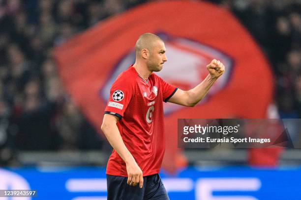 Burak Ylmaz of Lille celebrates his goal during the UEFA Champions League Round Of Sixteen Leg Two match between Lille OSC and Chelsea FC at Stade...