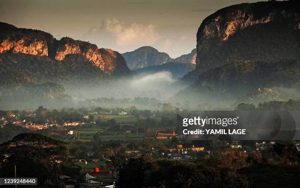 View of the hummocks of Vinales, Pinar del Rio province, Cuba, on February 19, 2022. - Vinales, a town with an incipient tourism industry that boomed...