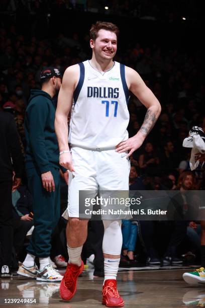 Luka Doncic of the Dallas Mavericks looks on and smiles during the game against the Brooklyn Nets on March 16, 2022 at Barclays Center in Brooklyn,...