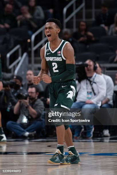 Michigan State Spartans guard Tyson Walker celebrates on the court during the mens Big Ten tournament college basketball game between the Michigan...