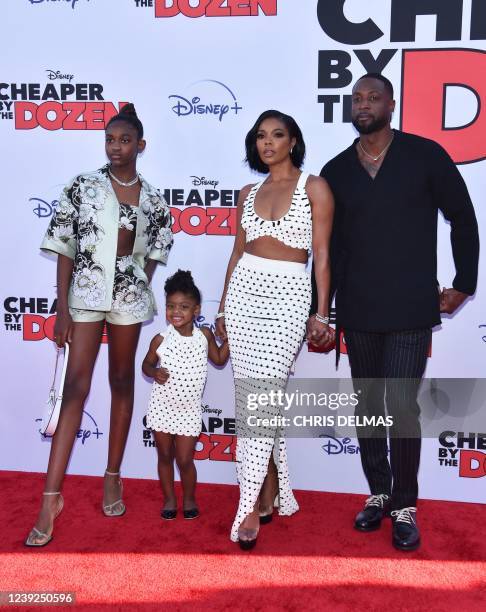 Actress Gabrielle Union and her husband former professional basketball player Dwyane Wade pose with daughters Zaya Wade and Kaavia James Union Wade...