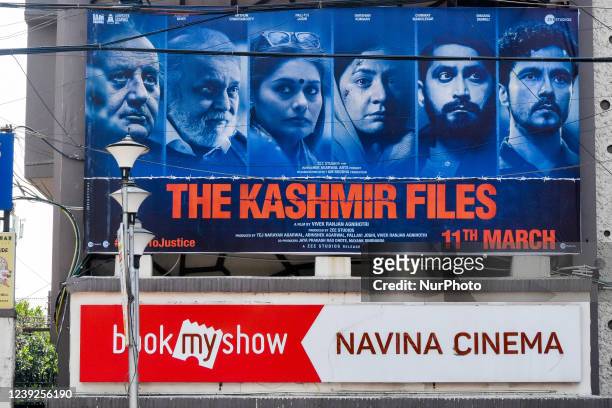 &quot; The Kashmir Files &quot; movie poster as seen on the billboard of a movie theater in Kolkata , India , on 17 March 2022 .The Kashmir files is...