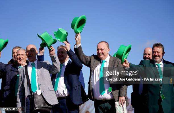 Group of racegoers from Grantham wearing green to celebrate St. Patrick's Day, arriving for day three of the Cheltenham Festival at Cheltenham...