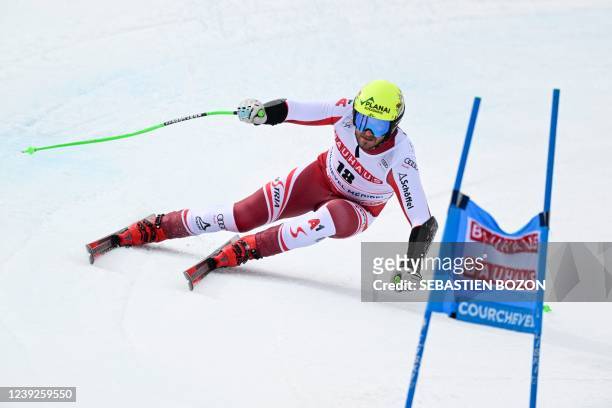 Austria's Daniel Danklmaier competes during the Men's Super-G of the FIS Alpine Ski World Cup finals 2021/2022 in Courchevel, French Alps, on March...