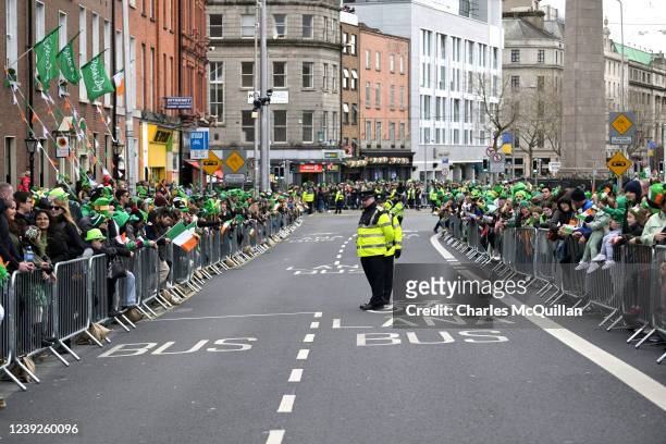 Revellers line the streets before the start of the St Patrick's Day parade on March 17, 2022 in Dublin, Ireland. St Patrick's Day celebrations return...