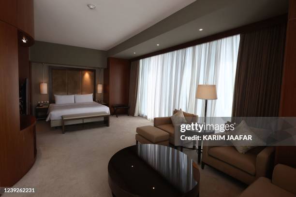 Picture shows a room at the JW Marriott Marquis hotel in the Qatari capital Doha on March 16, 2022. - Fans have sought 17 million tickets for this...