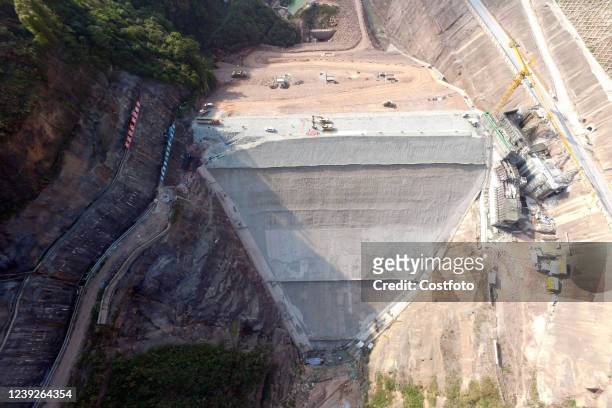 The lower reservoir dam of Chongqing Panlong Pumped Storage Power Station, built by China Energy Construction Gezhouba Municipal Corporation, has...