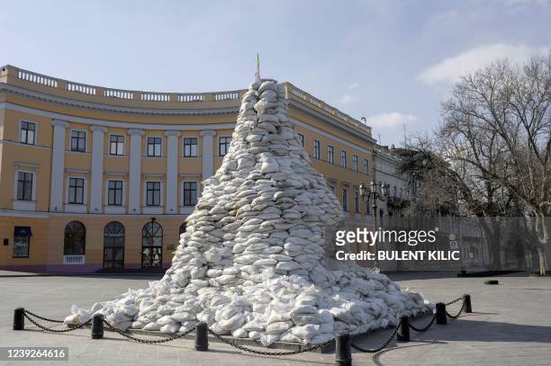 Monument to Odessa's city founder Duke de Richelieu is protected with sand bags in Odessa on March 17, 2022. - Odessa, which Ukraine fears could be...