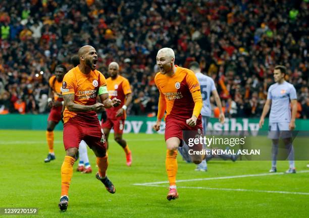 Galatasaray's Brazilian defender Marcao celebrates after scoring a goal during the UEFA Europa League round of 16 secong leg football match between...