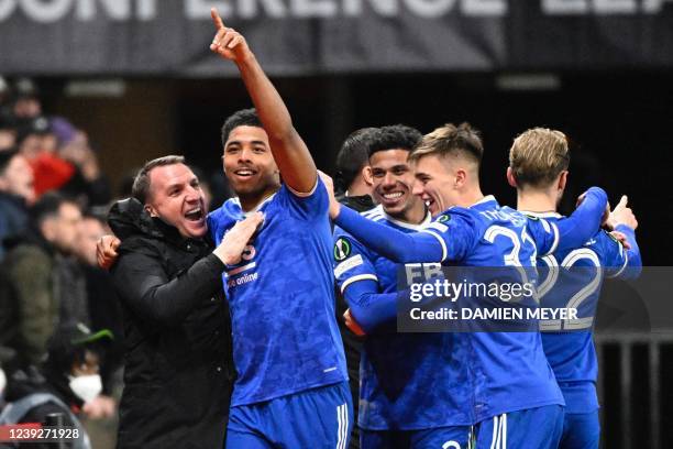 Leicester Citys French defender Wesley Fofana celebrates with Leicester Citys Northern Irish manager Brendan Rodgers during the UEFA Europa...