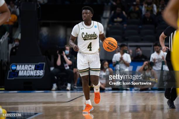 Colorado State Rams guard Isaiah Stevens brings the ball up the court during the mens March Madness college basketball game between the Michigan...