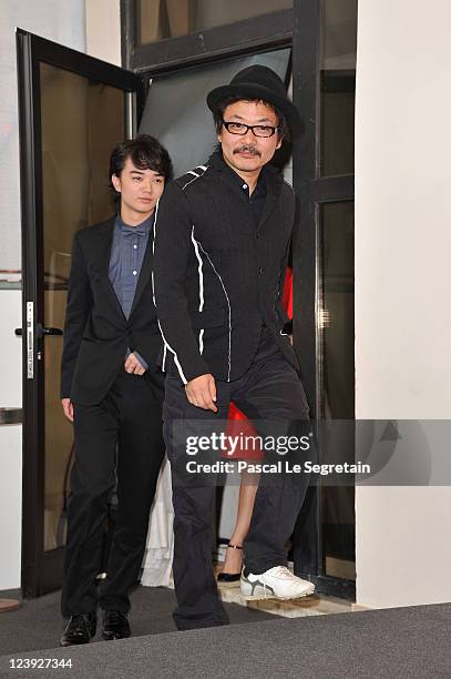 Director Sion Sono and actor Shota Sometani arrive at the "Himizu" Photocall at the Palazzo del Cinema during the 68th Venice Film Festival on...