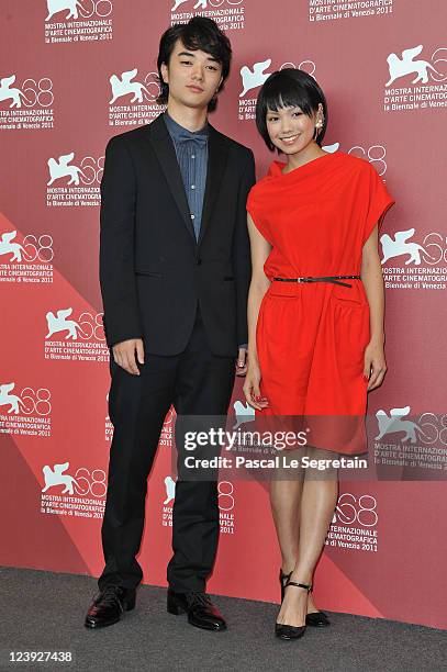 Actor Shota Sometani and actress Fumi Nikaido pose at the "Himizu" Photocall at the Palazzo del Cinema during the 68th Venice Film Festival on...