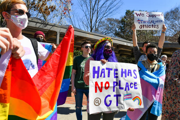 Counter-protestors gather to support transgender swimmer Lia Thomas at the NCAA Swimming and Diving Championships on March 17th, 2022 at the McAuley...