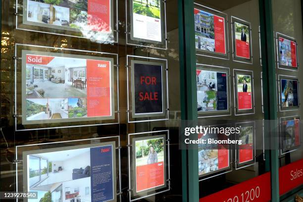 Residential property listings displayed at a real estate agency in Sydney, Australia, on Thursday, March 17, 2022. Sydney, scene of some of the...
