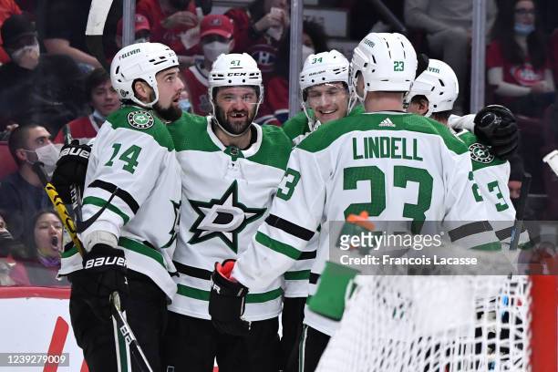 Jamie Benn, Alexander Radulov, Esa Lindell and Denis Gurianov of the Dallas Stars celebrate after scoring a goal againstthe Montreal Canadiens in the...