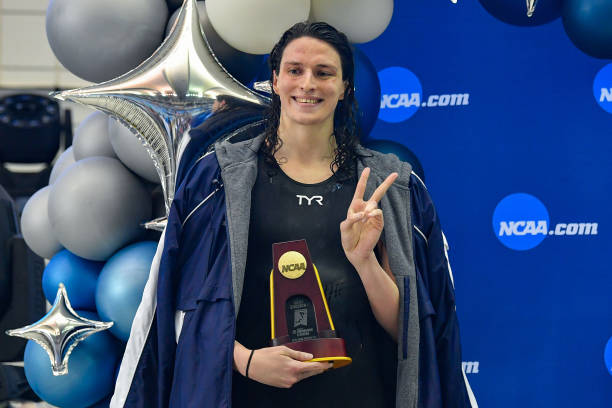 University of Pennsylvania swimmer Lia Thomas accepts the winning trophy for the 500 Freestyle finals during the NCAA Swimming and Diving...