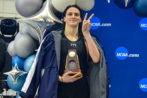 University of Pennsylvania swimmer Lia Thomas accepts the winning trophy for the 500 Freestyle finals during the NCAA Swimming and Diving...
