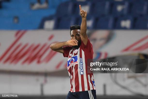 Junior's Luis Gonzalez celebrates after scoring against La Equidad during the Sudamericana Cup first round second leg all-Colombian football match,...