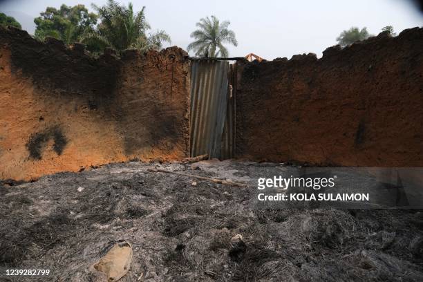 General view of the burnt house of the late chief of Manga Village, that borders Nigeria and Cameroon, on January 28, 2022 weeks after suspected...