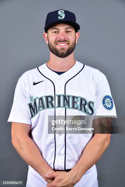 Mitch Haniger of the Seattle Mariners poses for a photo during the Seattle Mariners Photo Day at Peoria Sports Complex on Wednesday, March 16, 2022...