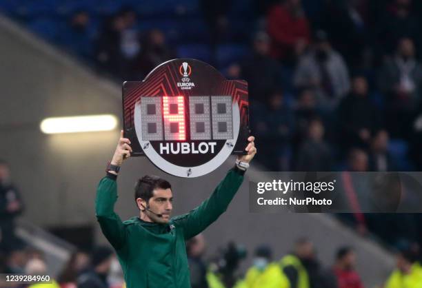 Refree Mr Fabio MARESCO of Itali showing the extra time during the UEFA Europa League, Round of 16, 2nd leg football match between Olympique Lyonnais...