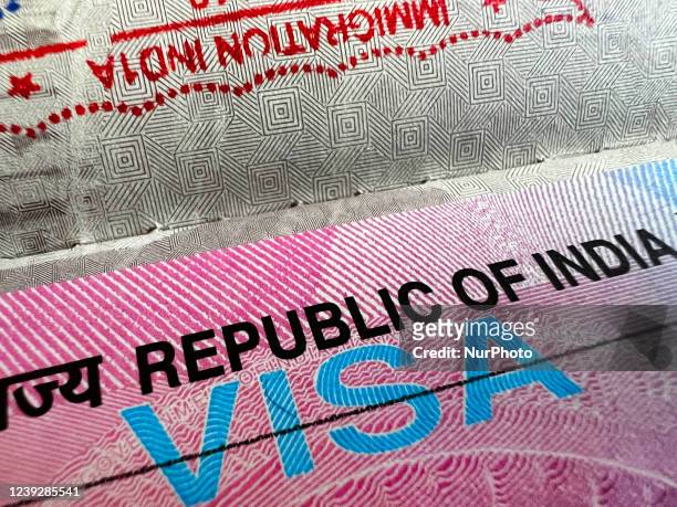 India tourist visa is seen in a passport in Brampton, Ontario, Canada, on March 17, 2022. Following a two year suspension due to the COVID-19...