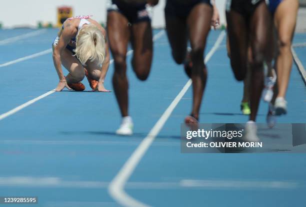 Ukraine's Tetiana Petlyuk crunches to the track during her women's 800 metres heats at the International Association of Athletics Federations World...