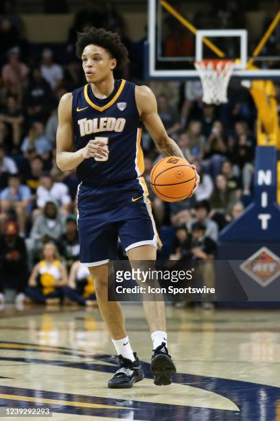 Toledo Rockets guard Ryan Rollins dribbles the ball during a first round basketball game of the National Invitational Tournament between the Dayton...