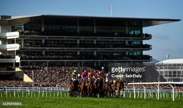 Gloucestershire , United Kingdom - 18 March 2022; Runners and riders during the McCoy Contractors County Handicap Hurdle during day four of the...