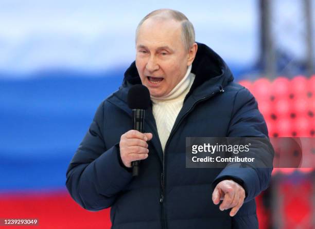 Russian President Vladimir Putin speaks during a concert marking the anniversary of the annexation of Crimea, on March 18, 2022 in Moscow, Russia....
