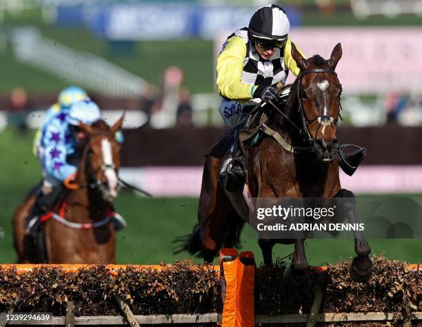 Jockey Sean O'Keeffe rides horse 'The Nice Guy' to win the Albert Bartlett Novices' Hurdle on the final day of the Cheltenham Festival at Cheltenham...