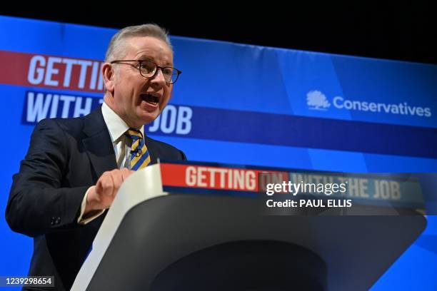 Britain's Housing and Levelling-Up Secretary Michael Gove addresses delegates during the Conservative Party Spring Conference, at Blackpool Winter...