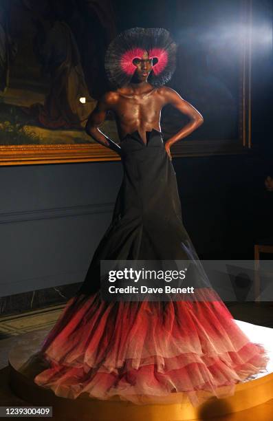 Model poses at 'Fashion In Motion: Harris Reed', a live show featuring highlights from Reed's collections in a specially-commissioned fashion...