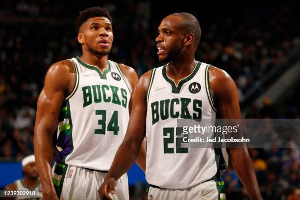 Giannis Antetokounmpo of the Milwaukee Bucks and Khris Middleton look on during the game against the Golden State Warriors on March 12, 2022 at Chase...