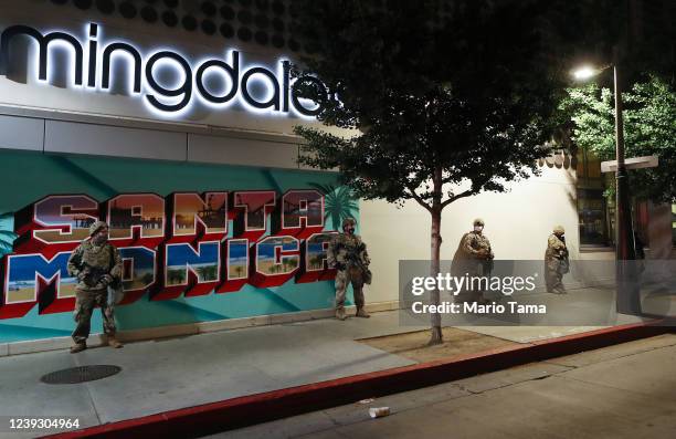 National Guard troops are positioned outside a Bloomingdale's which was looted, amid demonstrations in the aftermath of George Floyd’s death, on May...