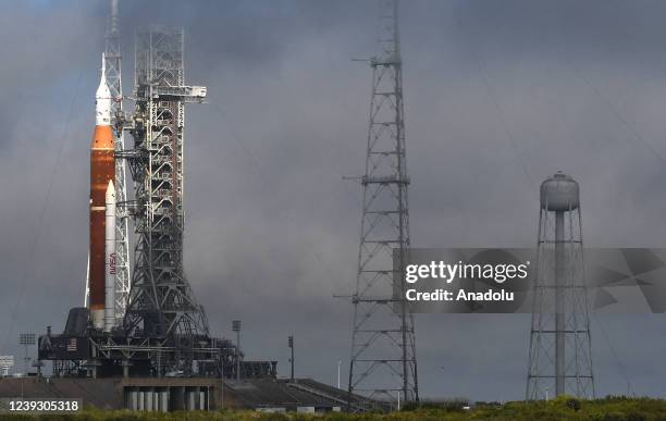 The SLS moon rocket topped by the Orion spacecraft stands at launch complex 39B following an overnight rollout from the Vehicle Assembly Building at...