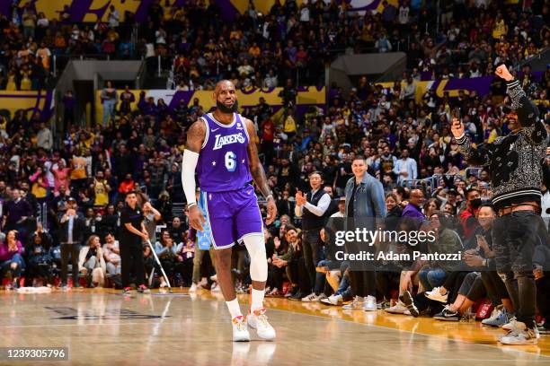 LeBron James of the Los Angeles Lakers reacts to a play during the game against the Washington Wizards on March 11, 2022 at Crypto.Com Arena in Los...